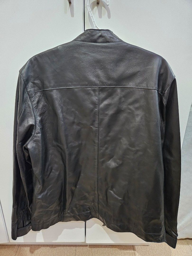 INC International Concepts Black Leather Jacket Size L (Category: Coats, Jackets and Outerwear) located in Las Pinas. Submitted by bellaprima888 (Listing ID 1464359887, Image 3). Description: - Genuine black leather jacket from INC International Concepts - Almost new - Polyester lining - Zip-up front closure - Multiple zip pockets for secure storage - Snap closure on the collar - Classic, versatile style for layering or standalone wear.
