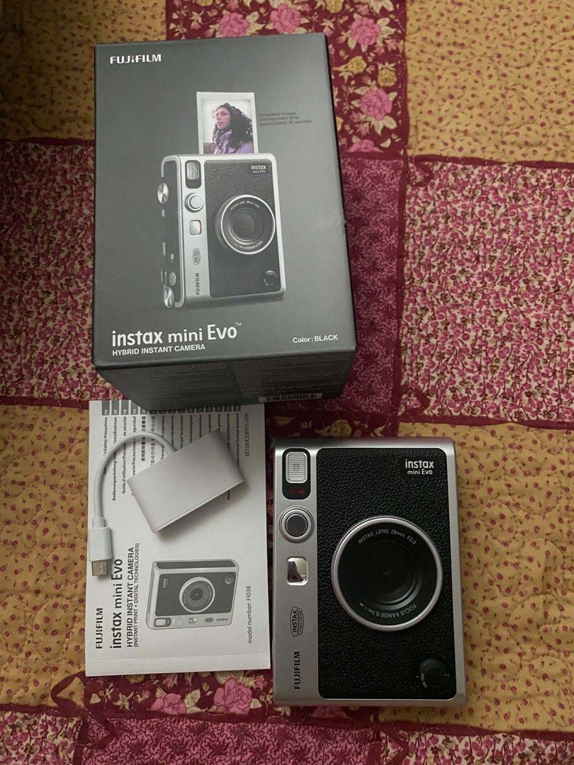 Instax Mini Evo Hybrid (Category: Camera Bags & Carriers) located in Manila. Submitted by cabugaochi35774 (Listing ID 1464555672, Image 1). Description: 10000 nego. Good as new with original charger and box.