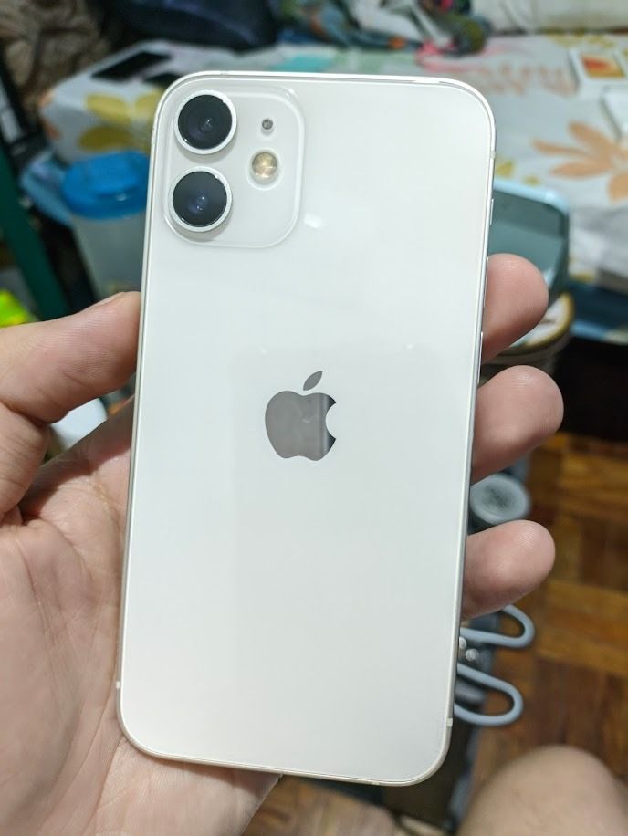 iPhone 12 Mini 64GB Factory Unlocked White (Category: Other Mobile & Gadget Accessories) located in Quezon City. Submitted by Mr.Skyler (Listing ID 1464566802, Image 2). Description: FOR ONLY 10.2K PRICE FACE ID AND TRUE TONE WORKING around 98% smoothness overall STILL PRESENTABLE NEVER BEEN OPENED OR REPAIRED 74% BATTERY HEALTH STILL ORIGINAL BATTERY GREAT BATTERY LIFE STILL FACTORY UNLOCKED OPENLINE TO ALL NETWORKS LATEST IOS 26.0 MEETUPS LRT 1
