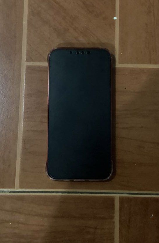 Iphone 13 Series (Category: iPhone 13 Series) located in Quezon City. Submitted by aea681 (Listing ID 1464491571, Image 1). Description: - iPhone 13 Series - Storage: 128GB - Color: PRODUCT(RED) - Condition: 5/5 (Excellent), No issues with the software - Has a dent on the lower right side, no scratches on the screen or at the back - Battery Health: 76% - Can still be used half day before being charged again - No box - No charger.