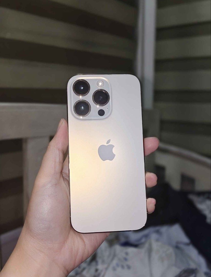 IPhone 14 Pro 97% Battery Health (Category: iPhone 14 Series) located in Manila. Submitted by werpontop (Listing ID 1464451348, Image 1). Description: Gold 128GB Factory Unlocked 97% Battery Health (Original sobrang kunat) No issue/history of replacement no dents/scratches J/A Japan Variant All working!! Inclusion: Tempred Installed, Case, Original charger set Manila Area!!.