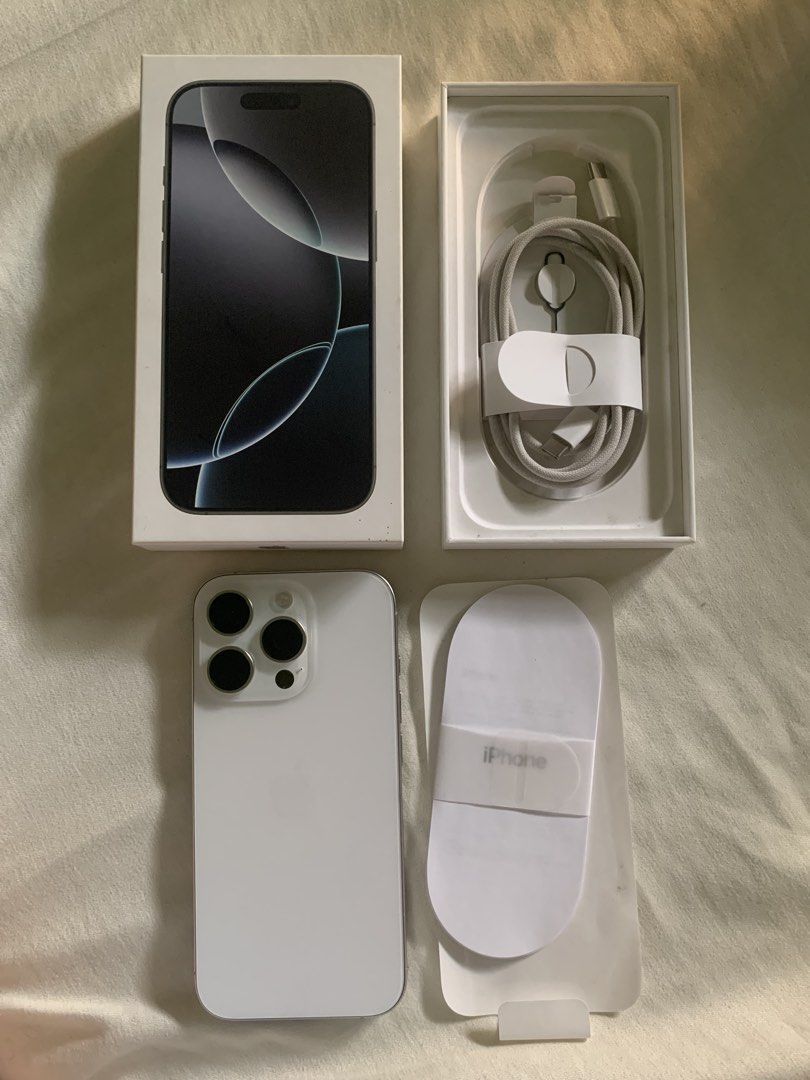 Iphone 16 Pro 256gb (Category: iPhone 16 Series) located in Angeles City. Submitted by inahaldrienne (Listing ID 1464358409, Image 2). Description: - iPhone 16 Pro - 256GB Storage -89% BH - White Titanium color - Complete set with box and cable -No issue, dents & scratches Rfs: upgrade.