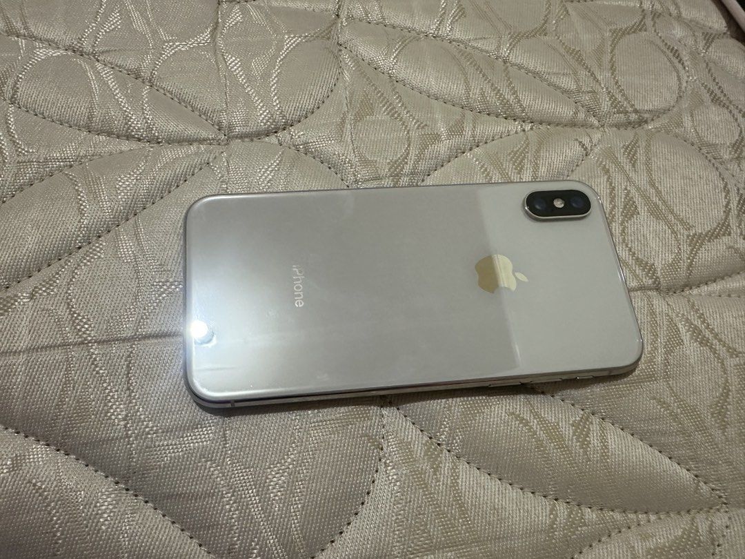 Iphone X (Category: iPhone X Series) located in Manila. Submitted by shopdenisse (Listing ID 1464385306, Image 2). Description: GLOBELOCKED may obvious signs of use screen also has cosmetic scratches but you can cover with screen protector Battery replaced by third party repair shop Pwede pa as your main phone as long as not a gamer, mainly for call/text, banking, soc med, etc. Rfs: want to buy new phone .