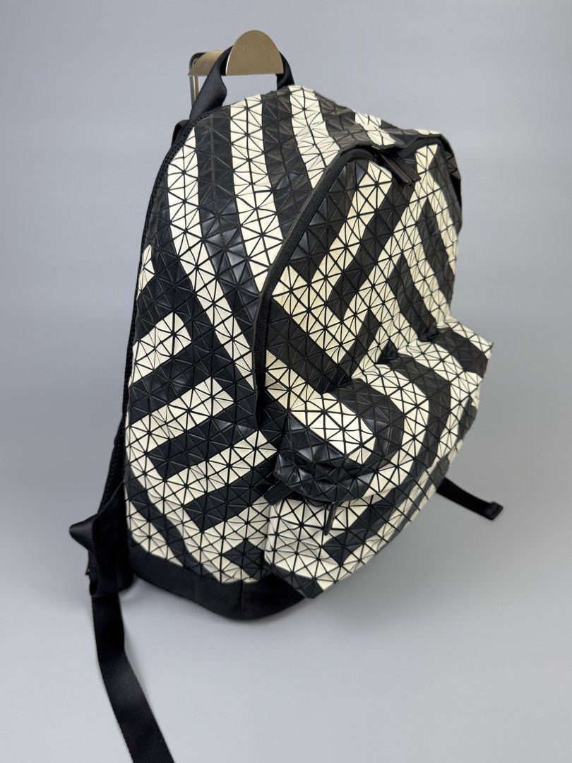 Issey Miyake - Rare Black Geometric Pattern - Backpack (Category: Luxury Bags & Wallets) located in Quezon City. Submitted by japon_rose (Listing ID 1464436705, Image 2). Description: READ DESCRIPTION FIRST BEFORE YOU START A DEAL GUARANTEED AUTHENTIC ❗️ Issey Miyake - Rare Black Geometric Pattern - Backpack (UNISEX) Color: Black/ White Dimensions: Length: 16 Width: 14 Side: 5.5 Under: 6 Body Strap: Adjustable (MEASURED IT BY INCHES) Condition: I