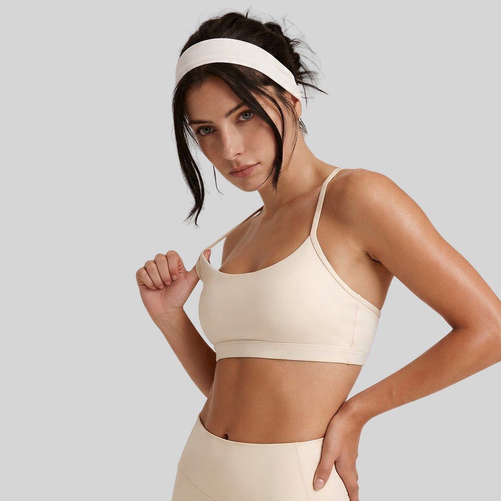 Ivory Sports Bra in Small (Category: Activewear) located in Pasig City. Submitted by lovedbymai_ (Listing ID 1464404923, Image 2). Description: can send actual photo.