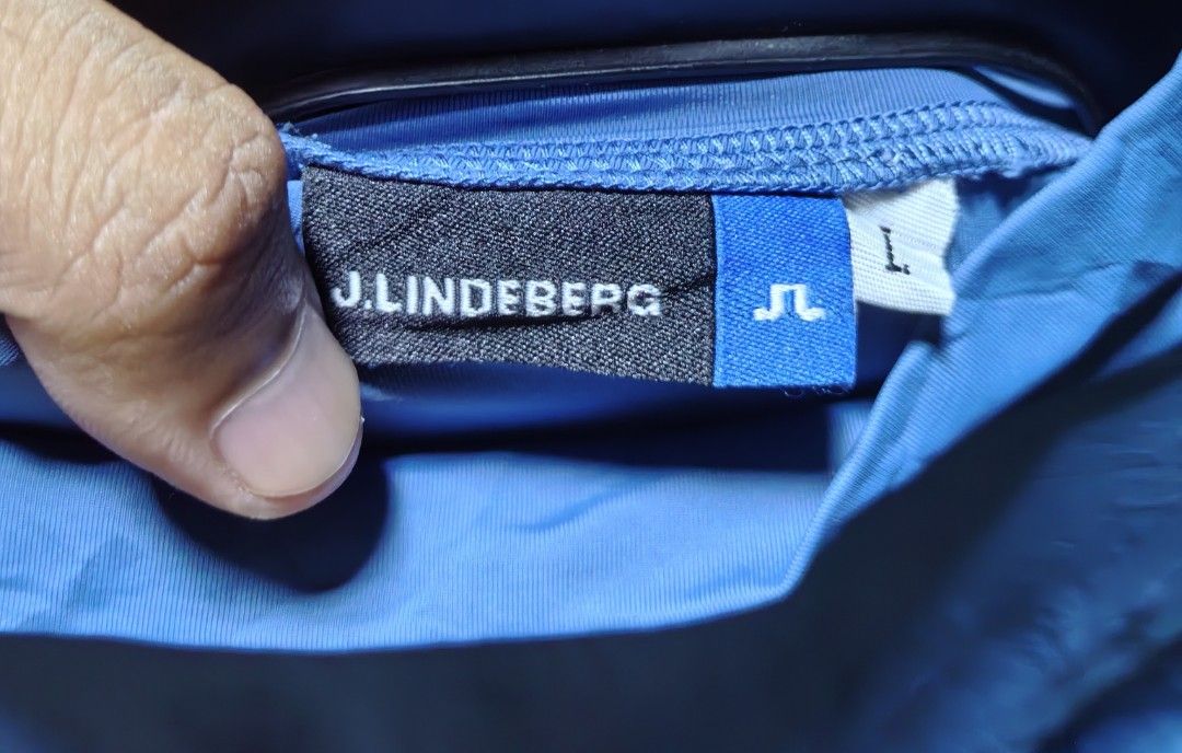 J. Lindeberg Blue Long Sleeve soft compression (Category: Longsleeves) located in Quezon. Submitted by miksxthrift (Listing ID 1464503178, Image 2). Description: - Brand: J. Lindeberg - Color: Blue - Sleeve Type: Long-sleeved - Size: L - Features: J. Lindeberg logo on back of neck and on sleeve - Ideal for: Sports or casual wear.