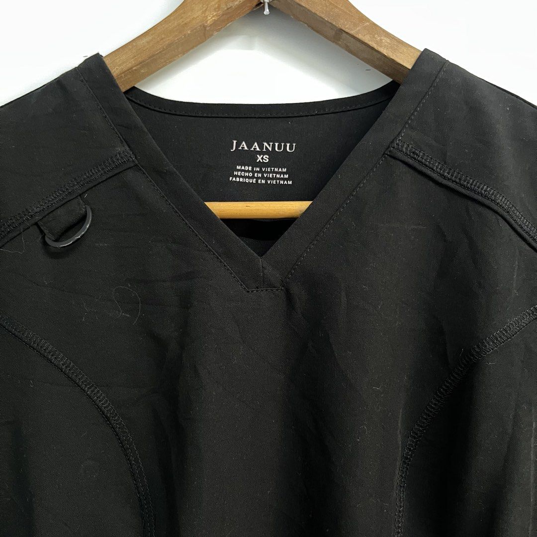 Jaanuu - Kass 4 Pocket V Neck Tops (Category: Activewear) located in Batangas. Submitted by wornwear.ph (Listing ID 1464406357, Image 3). Description: Jaanuu - Kass 4 Pocket V Neck Tops XS Width 18 inches Length 24” Excellent condition 680 only! .