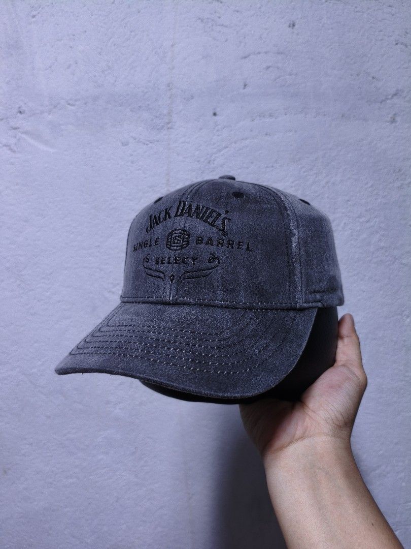 Jack Daniel's Single Barrel Select Baseball Cap (Category: Caps & Hats) located in Malilipot. Submitted by aronbigorn96320 (Listing ID 1464489533, Image 1). Description: - Grey Jack Daniel's baseball cap - Features 'Single Barrel Select' embroidered logo - Made of 100% cotton - Adjustable strap for a comfortable fit.
