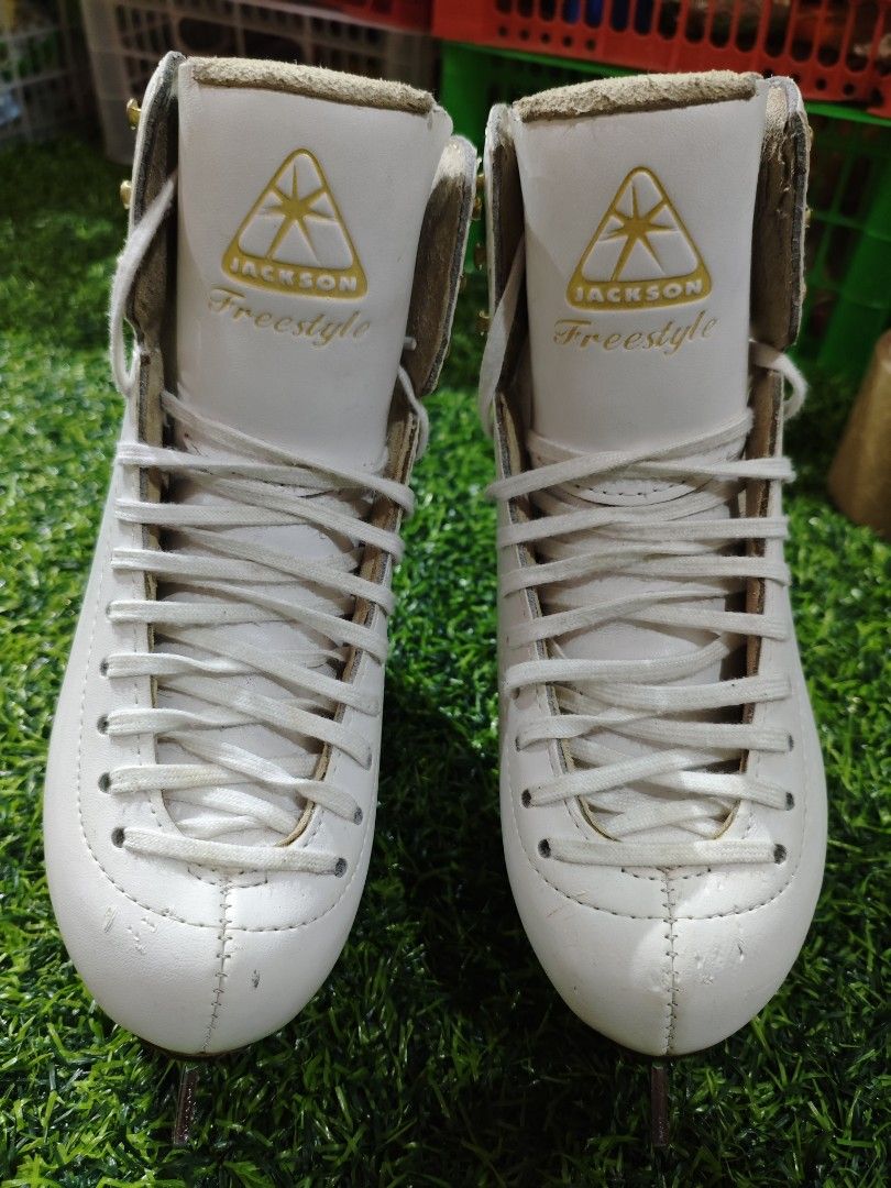Jackson Freestyle Figure Ice Skates (Category: Skates, Rollerblades & Scooters) located in Manila. Submitted by zealdragon.e46f60 (Listing ID 1464540821, Image 1). Description: Jackson Freestyle figure ice skates. White leather boots with laces. Gold accents on the tongue. Blades are marked 'Aspire'. Size 11/2C. Great for learning or recreational skating. Some minor scuffs on the boots..