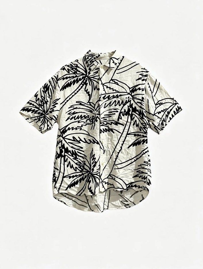 JAMS WORLD (Category: Tshirts & Polo Shirts ) located in Davao. Submitted by sart0ria85 (Listing ID 1464481135, Image 1). Description: A black and white print button collared shirt. Details faded. MEDIUM. Size 6z EXCELLENT CONDITION (91/100).