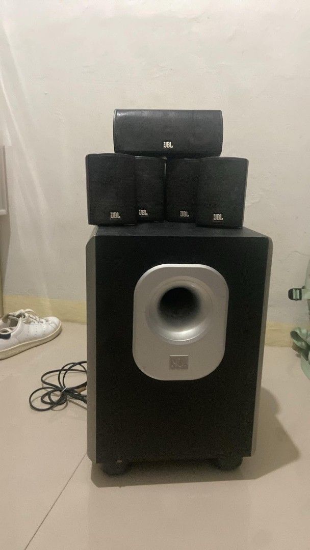 JBL 5.1 Speaker System with Subwoofer (Category: Soundbars, Speakers & Amplifiers) located in Cavite. Submitted by jesusahec44856 (Listing ID 1464449369, Image 1). Description: - JBL 5.1 Speaker System - Includes 1 Subwoofer and 5 Satellite Speakers - Ideal for Home Theater Setups - All speakers feature the iconic JBL logo - Subwoofer has a distinctive silver port - Minor cosmetic wear on the subwoofer casing - All necessary cables are included.