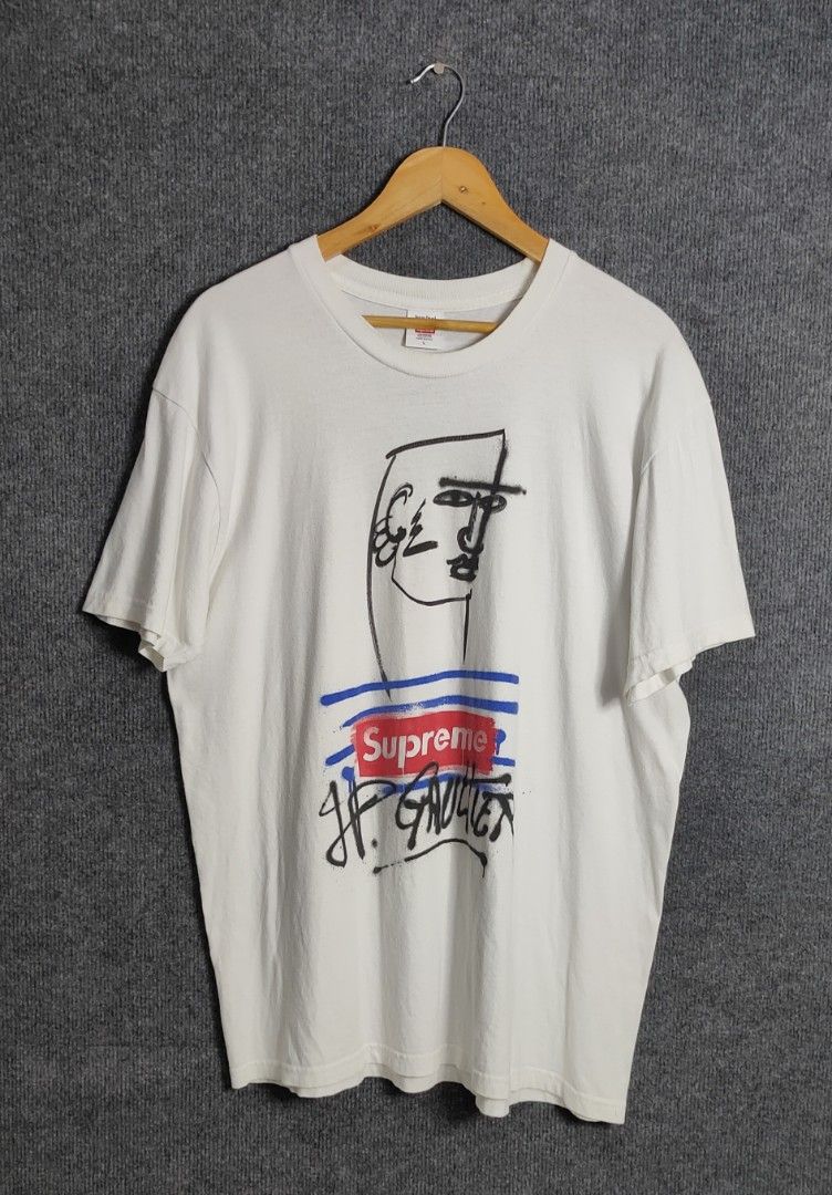 Jean Paul Gaultier x Supreme (Category: Tshirts & Polo Shirts ) located in Bolinao. Submitted by tokiya. (Listing ID 1464407481, Image 1). Description: Jean Paul Gaultier x Supreme Size Large 22.5x30.5 (minimal crack, not noticeable).