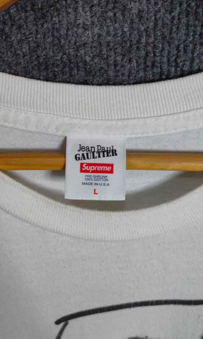 Jean Paul Gaultier x Supreme (Category: Tshirts & Polo Shirts ) located in Bolinao. Submitted by tokiya. (Listing ID 1464407481, Image 3). Description: Jean Paul Gaultier x Supreme Size Large 22.5x30.5 (minimal crack, not noticeable).