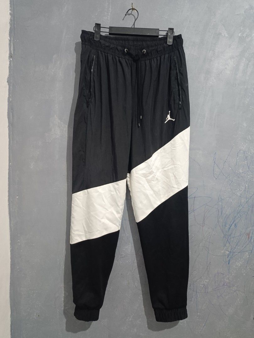 Jordan Track Pants Black White Size M (Category: Joggers) located in Iloilo. Submitted by wendxcz-thrift- (Listing ID 1464445228, Image 1). Description: - Jordan track pants in black and white - Iconic Jumpman logo on left leg - Comfortable elastic waistband with adjustable drawstring - Two secure zippered side pockets - Breathable mesh lining - Ideal for everyday wear or athletic activities MOP: GCASH/BPI + SF.