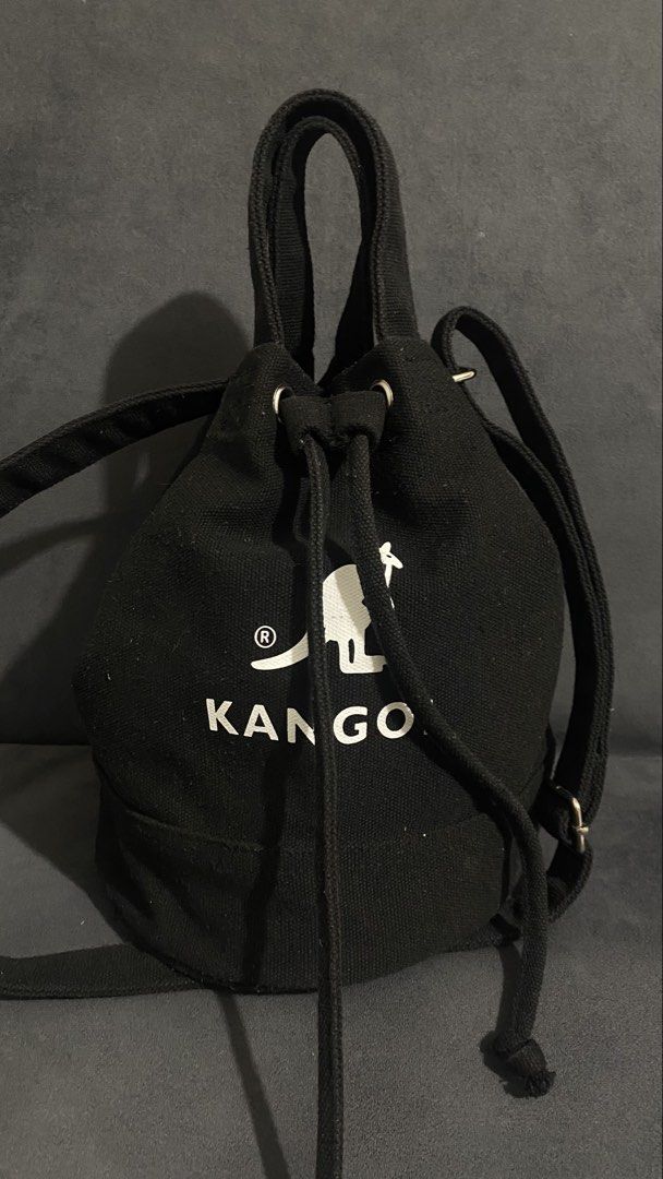 Kangol Black Bucket Sling Bag (Category: Cross-body Bags) located in Lapu Lapu. Submitted by any_thrift (Listing ID 1464518675, Image 1). Description: In good condition Thrifted Korean Surplus Can fit phones and medium wallet .