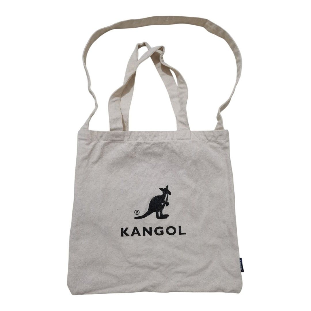 Kangol Eco-Friendly 2-Way Canvas Tote Bag (Category: Tote Bags) located in Santa Cruz. Submitted by oddpenguin-4575 (Listing ID 1464539544, Image 1). Description: 📌.....P L E A S E R E A D..... 📌measurement:L-14" /W-14.5" 📌color-9/10 📌Brand:Kangol 📌issue:sign of usage 📌This is an authentic Kangol Eco-Friendly 2-Way Canvas Tote Bag. It is designed with dual carrying options, featuring both standard handheld top handles and a longer shoulder 