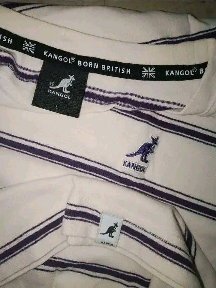 Kangol Stripe Tee (Category: Activewear) located in Guihulngan. Submitted by johnjohndripgoods (Listing ID 1464369047, Image 2). Description: KANGOL DIMES: 21x29 EXCELLENT CONDITION 9.5/10 COLOR RATE NO ISSUE NEEDS WASH FREE TO VOUCH OPEN FOR VC DM.