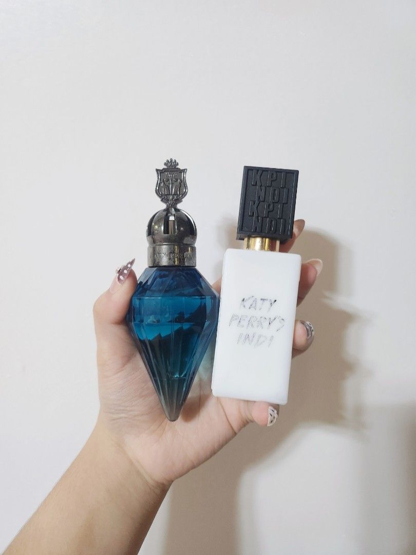 Katy Perry Fragrances Eau De Parfum (Category: Fragrance & Deodorants) located in San Fernando. Submitted by curatedbyaub (Listing ID 1464232344, Image 1). Description: Killer Queen's Royal Revolution - authentic from the US - 30ml bottle (97% full) Katy Perry's INDI - authentic from the UK - 30ml bottle (98% full) - ₱700 each / ₱1,300 if taking both - note that these were stocked so their scent might've changed over time - from gift sets kaya wa
