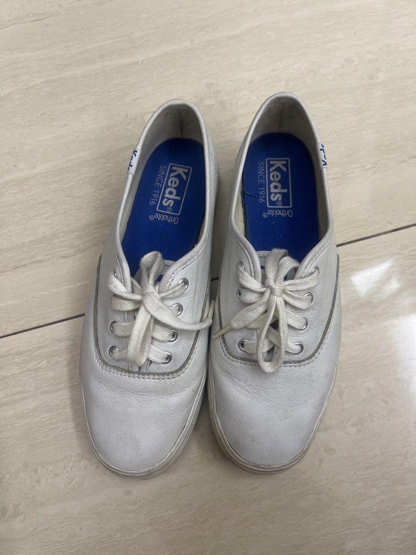 Keds White Leather Ortholite Sneakers (Category: Sneakers) located in Manila. Submitted by msbeautiful (Listing ID 1464500622, Image 1). Description: - Classic white Keds sneakers - Made with genuine leather - Features Ortholite insoles for superior comfort - Lace-up closure for a secure fit - Ideal for everyday wear - Size: 5.5 US.