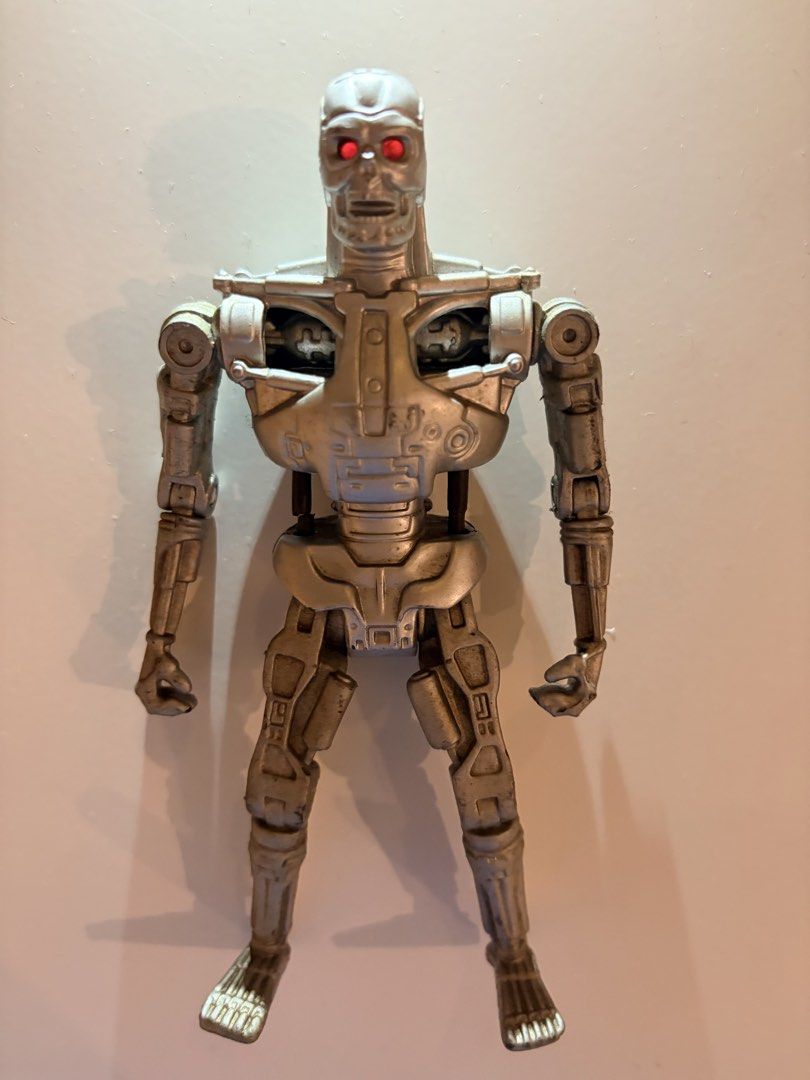 Kenner Terminator T-800 Action Figure (Category: Action & Battle Toys) located in Santa Rosa. Submitted by serf60762 (Listing ID 1464506026, Image 1). Description: Selling Vintage (1991) Terminator T-800 action figure (Terminator 2: Judgement Day) by Kenner for PhP 600 - From the iconic Terminator 2 movie - Features a highly detailed metallic finish - Glowing eyes when light hits top of head - Fully articulated joints for dynamic posing - A must-