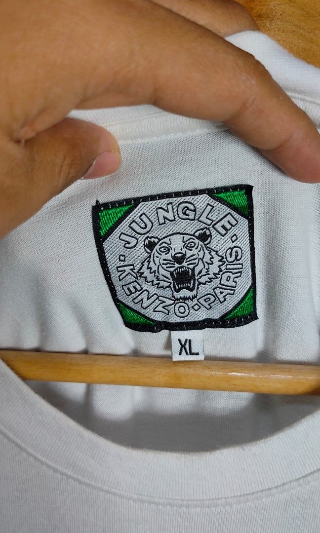 Kenzo (Category: Tshirts & Polo Shirts ) located in Bolinao. Submitted by tokiya. (Listing ID 1464399993, Image 3). Description: Kenzo Size Large 21x29 (minor yellow stain, not noticeable).