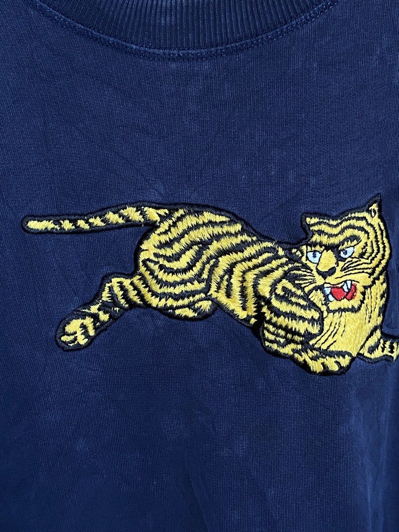 KENZO Jumping Tiger Sweatshirt — Ink Navy (Category: Coats, Jackets and Outerwear) located in Binmaley. Submitted by vanilla_style (Listing ID 1464396266, Image 2). Description: Authentic • Preloved condition Natural fade from wear — gives soft vintage look No holes, no stains, embroidery & prints intact Still very wearable ✨🤍 Original retail: ~₱15,000+.