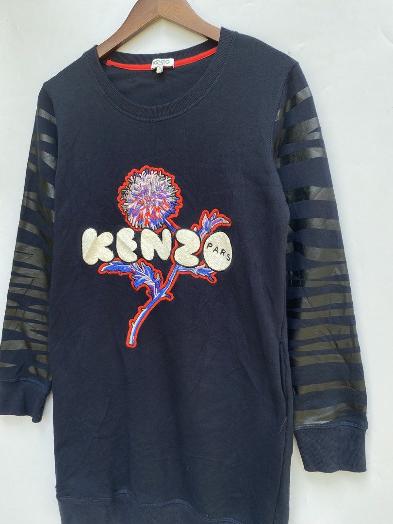 Kenzo Paris Embroidered Flower Sweatshirt (Category: Longsleeves) located in Manila. Submitted by deguertoje73072 (Listing ID 1464422394, Image 2). Description: - Navy blue Kenzo Paris sweatshirt - Size S - Large embroidered flower graphic with Kenzo Paris logo - Tiger stripe pattern on sleeves - Made in Morocco.