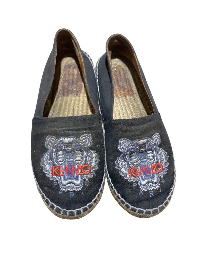 Kenzo Paris Tiger Espadrilles Black (Category: Flats & Sandals) located in Navotas City. Submitted by sophiadnse (Listing ID 1464424878, Image 1). Description: - Kenzo black espadrilles - Iconic tiger embroidery - Jute sole - Comfortable slip-on style - Perfect for casual wear - Minor signs of wear on insoles and soles.