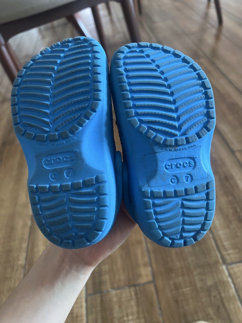 Kids' Crocs - Blue and Tan (Category: Babies & Kids Fashion) located in Manila. Submitted by cubbyhole525928 (Listing ID 1464400583, Image 2). Description: - Two pairs of kids' Crocs - Blue pair features fun Jibbitz (star, 'E') - Tan pair also available - Great for indoor and outdoor play - Comfortable and easy to clean -both size C7 Free jibbitz 700 for both.