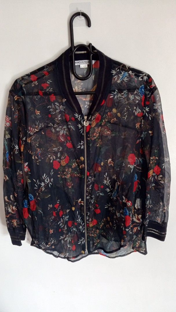 Kim Youngs Sheer Floral Bomber Jacket (Category: Coats, Jackets and Outerwear) located in Cebu City. Submitted by kangaroo78 (Listing ID 1464369100, Image 1). Description: - Sheer bomber jacket by Kim Youngs - Dark floral print with red roses and blue flowers - Zip-up front closure - Ribbed cuffs and hem - Lightweight and airy fabric - Ideal for layering over tops or dresses Location Dumlog Talisay City Cebu .