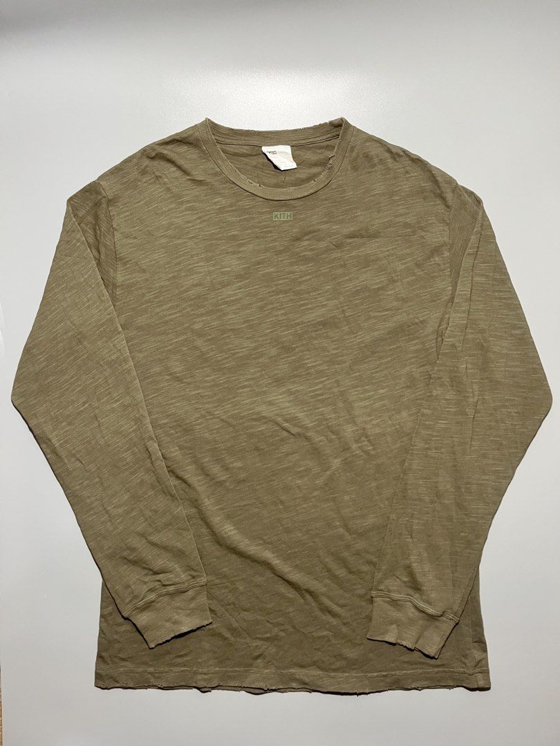 Kith Distressed Long Sleeve (Category: Coats, Jackets and Outerwear) located in Caloocan City. Submitted by jvn_23 (Listing ID 1464466068, Image 1). Description: Kith Distressed Long Sleeve Authentic/Legit💯 Excellent Condition 📍 No issue❗️ Color rate: 10/10📍 Dimes: 31” Length 21” Width Color may vary due to lighting. .