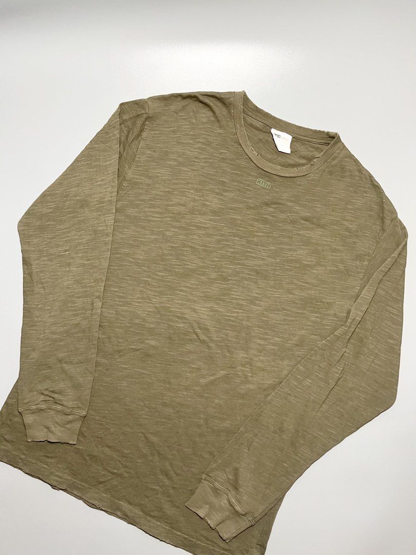 Kith Distressed Long Sleeve (Category: Coats, Jackets and Outerwear) located in Caloocan City. Submitted by jvn_23 (Listing ID 1464466068, Image 2). Description: Kith Distressed Long Sleeve Authentic/Legit💯 Excellent Condition 📍 No issue❗️ Color rate: 10/10📍 Dimes: 31” Length 21” Width Color may vary due to lighting. .