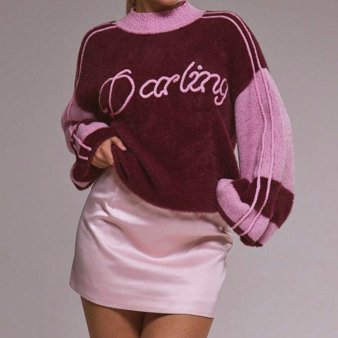 Knit Sweater Maroon Pink (Category: Coats, Jackets and Outerwear) located in Caloocan City. Submitted by yannabeeeee (Listing ID 1464468842, Image 3). Description: - Super cute fuzzy knit sweater - Maroon body with contrasting pink sleeves - "Darling" embroidery on the front - Stylish mock neck design - Perfect for casual wear and layering - Looks and feels incredibly comfy.