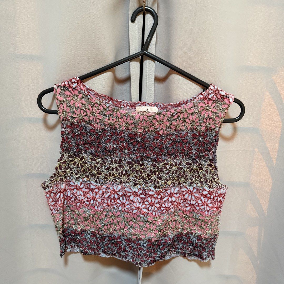 Lace Knit Crop Top (Category: Sleeveless) located in Makati City. Submitted by heyitsg_ (Listing ID 1464418154, Image 2). Description: - Cute ombre lace knit crop top - Colors: Shades of pink, burgundy, and gold - Material: Stretchy and very comfortable - Design: Sleeveless - Versatile: Great for layering or wearing on its own - Unique textured pattern - Fun addition to your wardrobe.
