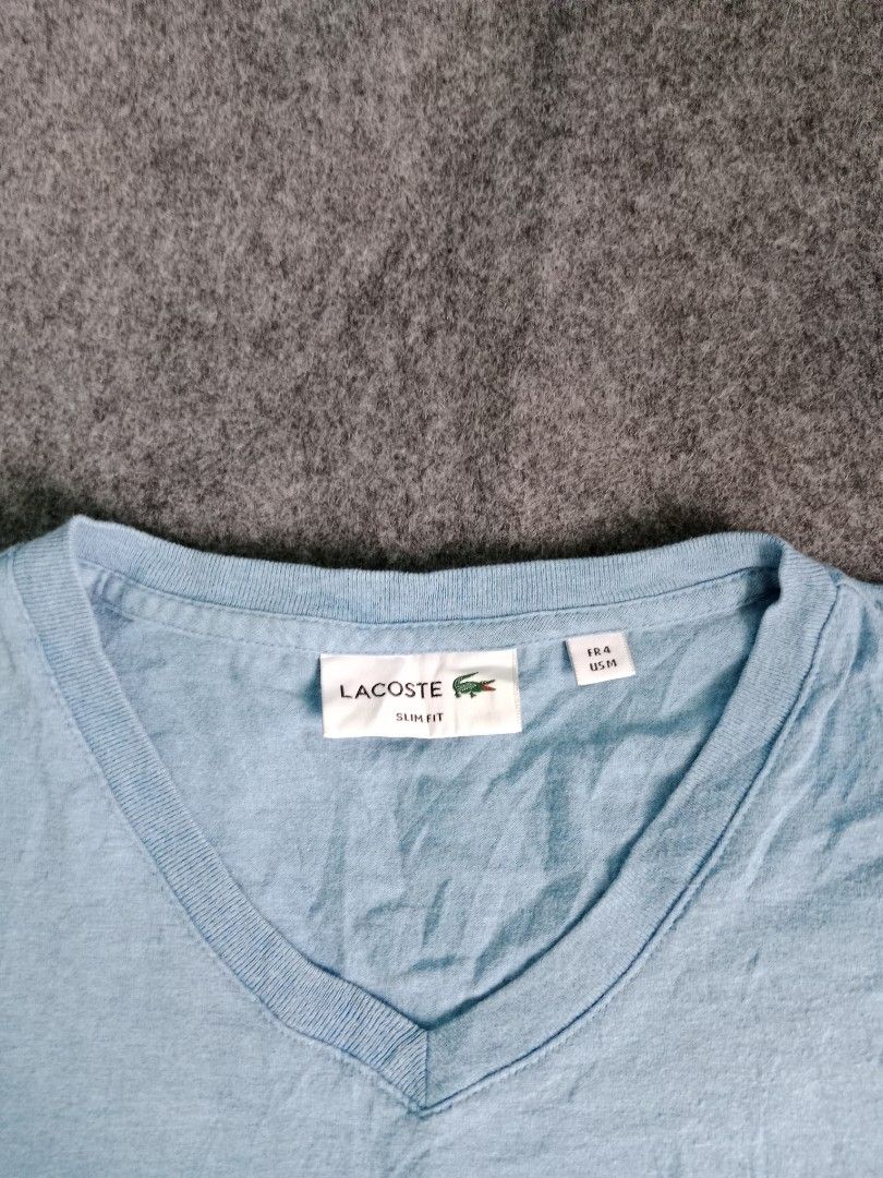 Lacoste (Category: Activewear) located in Alburquerque. Submitted by romnickhatosa (Listing ID 1464381316, Image 3). Description: Lacoste V-NECK size 4 excellent dimes 19 x 27.