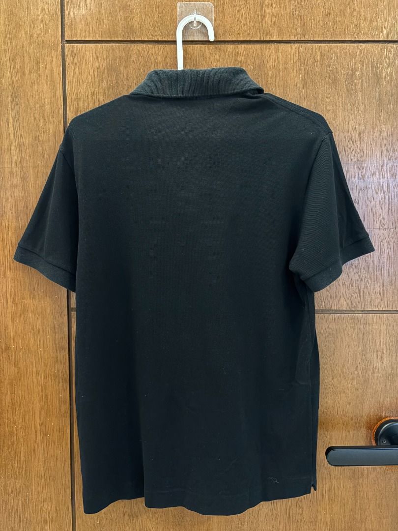 Lacoste Classic Pique Black Polo (Category: Tshirts & Polo Shirts ) located in Mandaluyong City. Submitted by jbor88 (Listing ID 1464362784, Image 3). Description: Lacoste Classic Pique Black Polo Short sleeves with ribbed collar Iconic crocodile logo embroidered on chest Two-button placket Italian Fit (Size 2) W=48cm L=64cm with fade under collar (not seen when worn).
