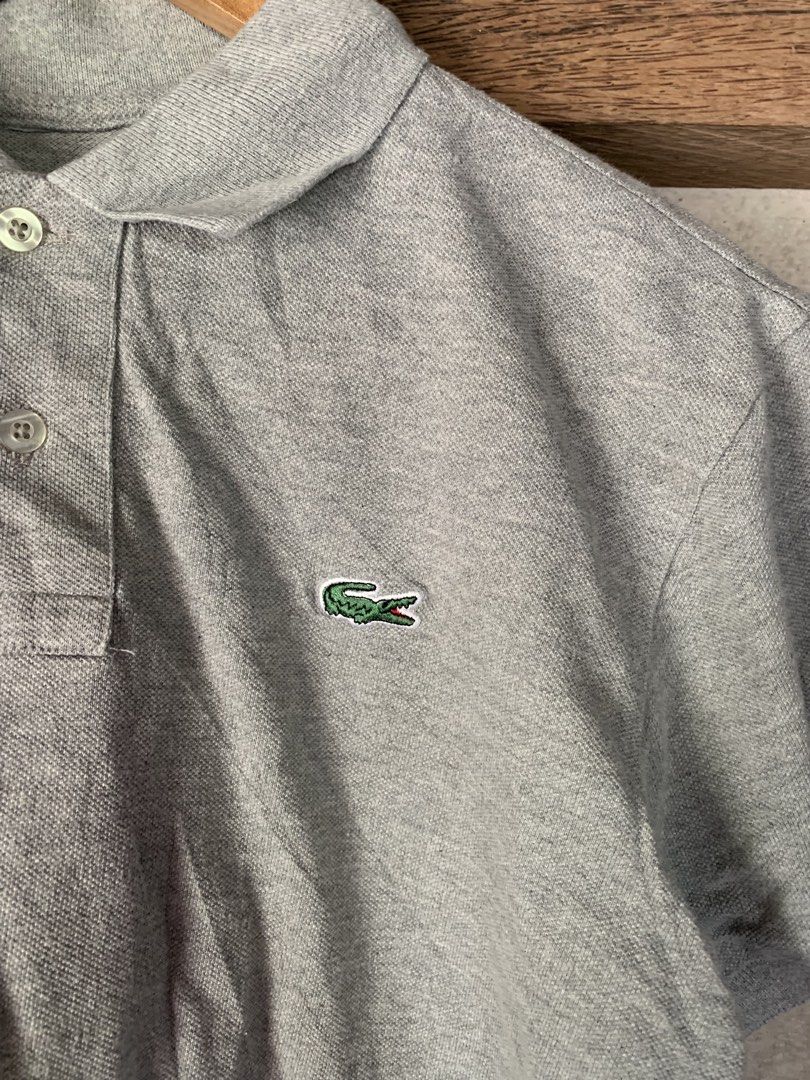Lacoste Gray Polo Shirt (Category: Announcements) located in Cebu City. Submitted by team13ios (Listing ID 1464435497, Image 3). Description: Lacoste Polo W-18 L-22 Excellent condition Issue- cut tag NeedWash.