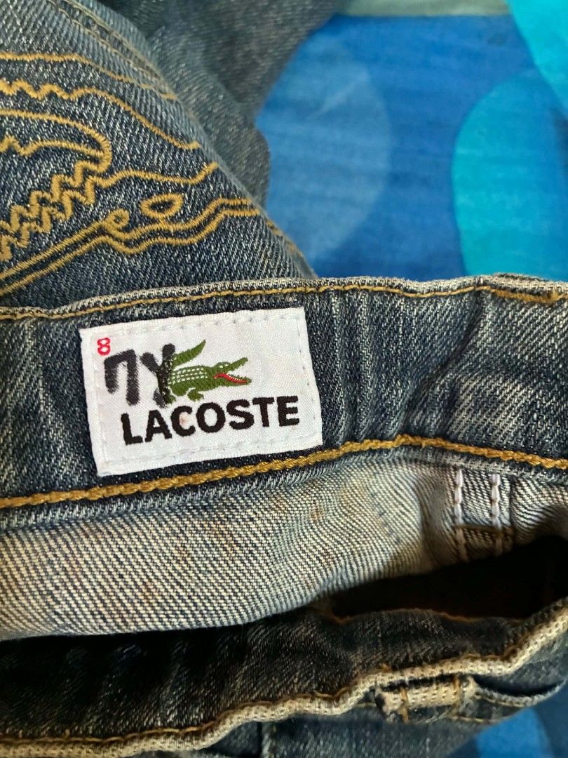 Lacoste Kids Flare Jeans Size 8 (Category: Babies & Kids Fashion) located in Nabunturan. Submitted by kairosas85 (Listing ID 1464378013, Image 3). Description: - Blue denim flare jeans for kids - Size 8 - Classic Lacoste crocodile logo on back pocket - Designed in France, Made in Thailand - Machine wash warm, no bleach - Great for everyday wear.