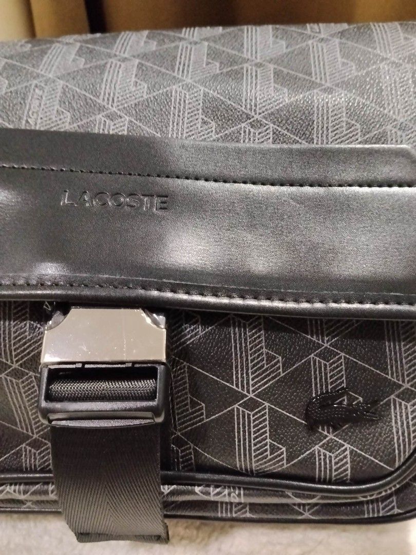Lacoste Messenger Bag for Men (Category: Sling Bags) located in Las Pinas. Submitted by jellybeansbag (Listing ID 1464504891, Image 3). Description: - Brand new lacoste messenger bag - Crossbody bag style - Flap close - Monogram print - Ideal for travellers and on the go people - Unisex - No Bogus Buyers and Joy Reservers please. - Mode of Payment via GoTyme or Gcash.