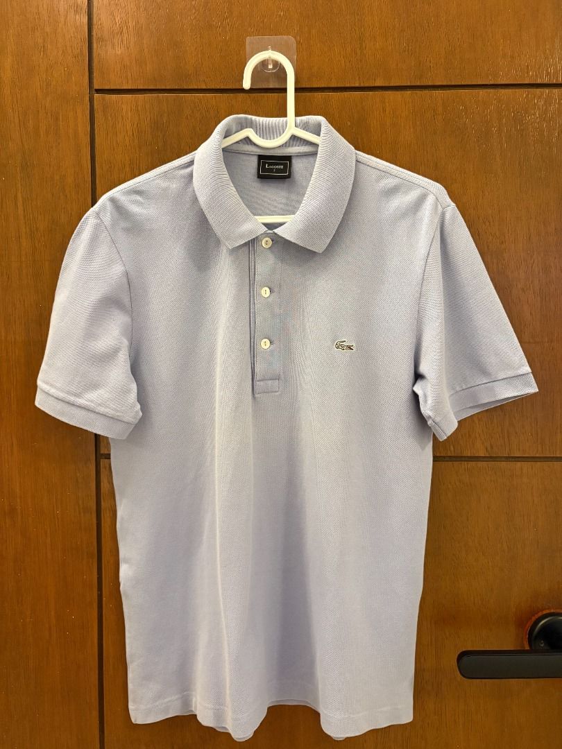 Lacoste Periwinkle w/ Silver Crocodile Polo (Category: Tshirts & Polo Shirts ) located in Mandaluyong City. Submitted by jbor88 (Listing ID 1464363841, Image 1). Description: Lacoste Periwinkle w/ Silver Crocodile Polo Italian Fit (Size 2) W=45cm L=64cm.