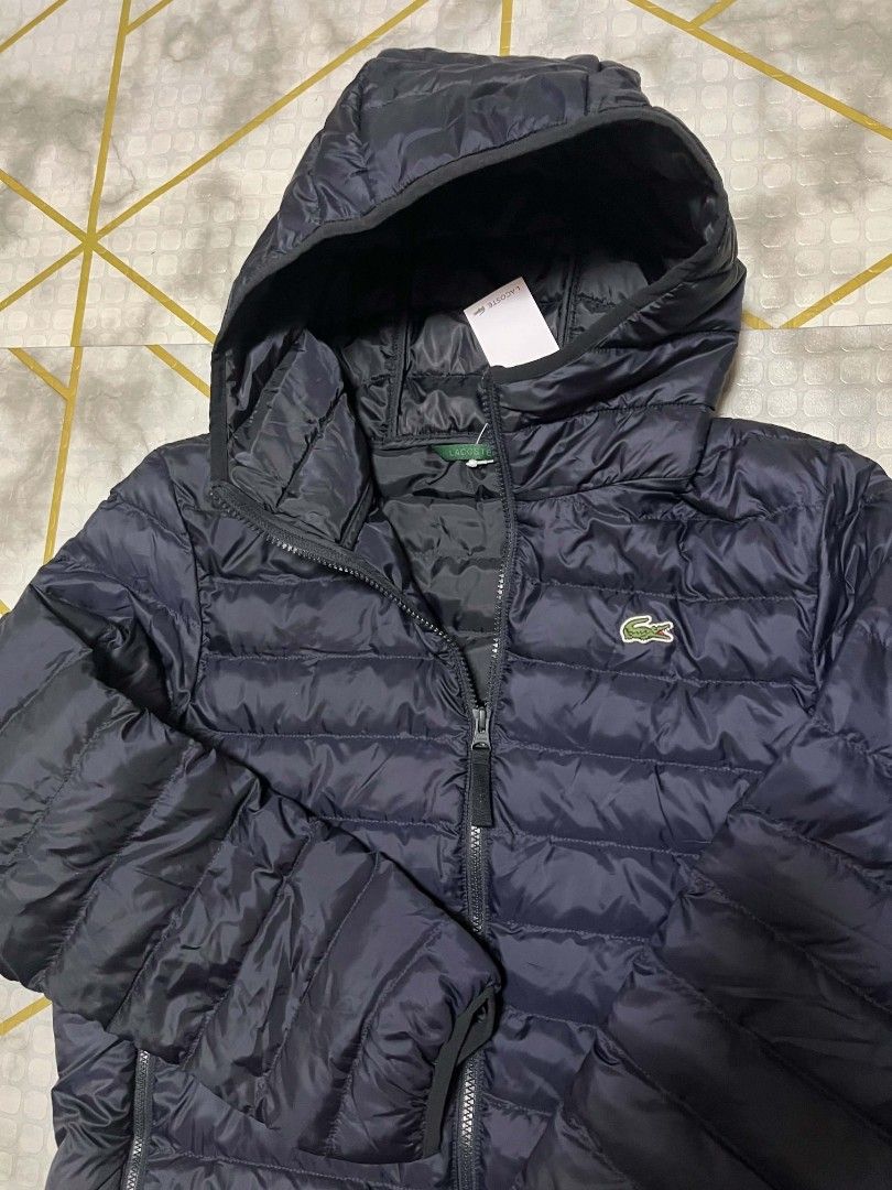 Lacoste Puffer Jacket (Category: Coats, Jackets and Outerwear) located in General Trias. Submitted by hungariancheesecake (Listing ID 1464360127, Image 2). Description: Lacoste Puffer Hoodie Jacket Small on Tag 20.5x26 Brandnew Authentic💯 Cavite Location Pm sa Interested.