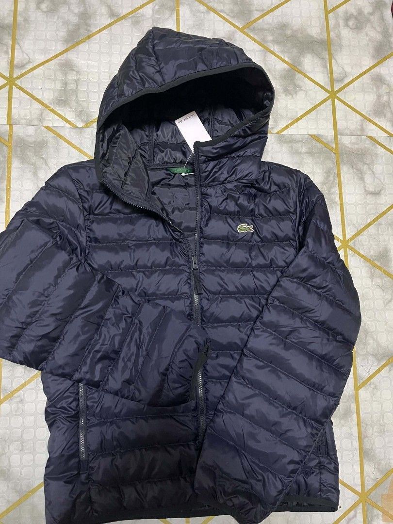 Lacoste Puffer Jacket (Category: Coats, Jackets and Outerwear) located in General Trias. Submitted by hungariancheesecake (Listing ID 1464360127, Image 1). Description: Lacoste Puffer Hoodie Jacket Small on Tag 20.5x26 Brandnew Authentic💯 Cavite Location Pm sa Interested.
