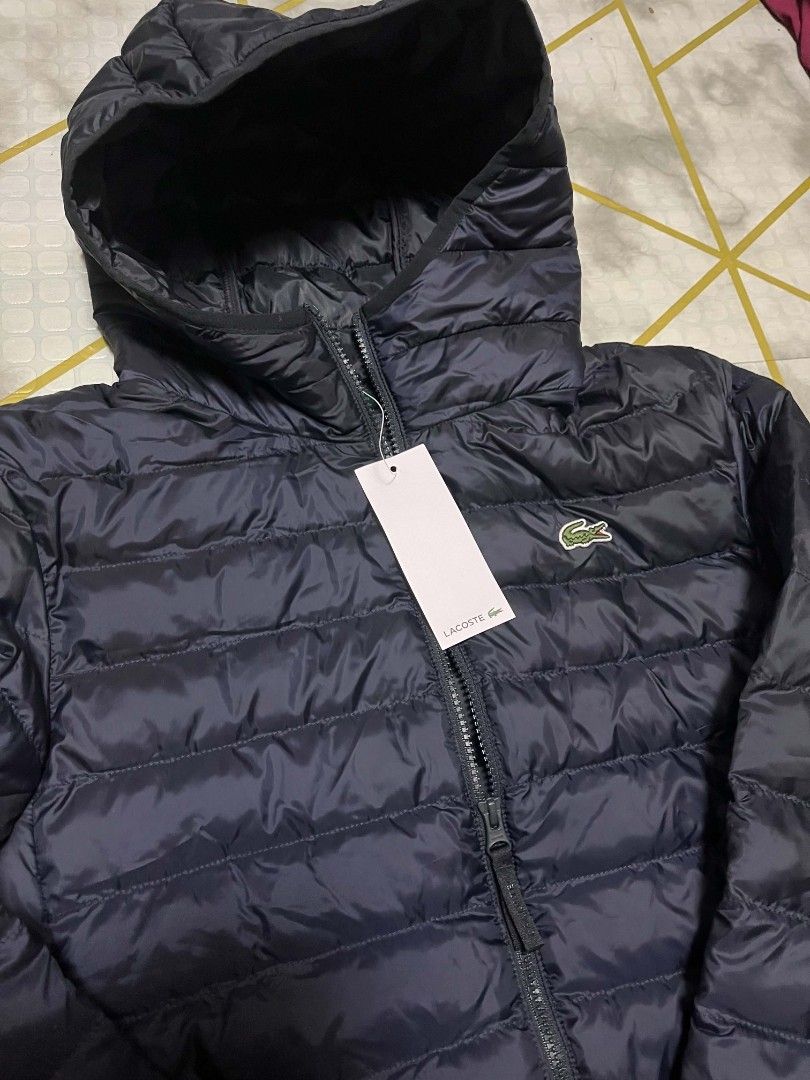 Lacoste Puffer Jacket (Category: Coats, Jackets and Outerwear) located in General Trias. Submitted by hungariancheesecake (Listing ID 1464360127, Image 3). Description: Lacoste Puffer Hoodie Jacket Small on Tag 20.5x26 Brandnew Authentic💯 Cavite Location Pm sa Interested.