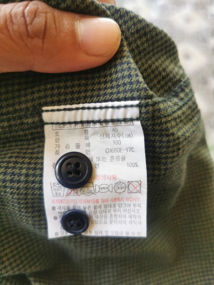 Lacoste Slim Fit Long Sleeve Button Down Shirt (Category: Formal Shirts) located in Davao. Submitted by dmp1993 (Listing ID 1464388628, Image 3). Description: Green Lacoste shirt with a subtle check pattern. Slim fit, long sleeves. Button-down collar. Small crocodile logo on the chest. Tag shows FR 40, US M. Made in Korea. Great for casual or smart casual wear..