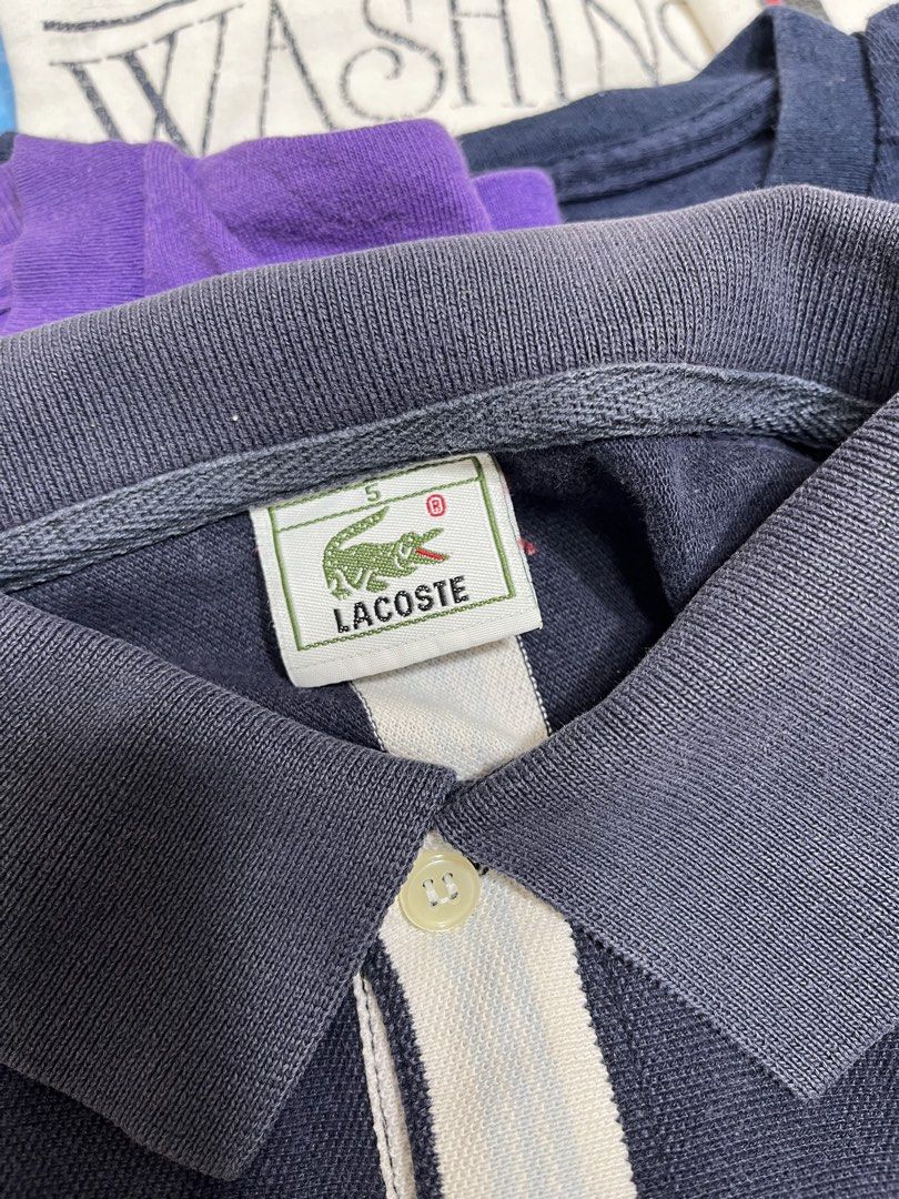 Lacoste Striped Polo Shirt Size 5 (Category: Tshirts & Polo Shirts ) located in Baao. Submitted by plainclothesdept (Listing ID 1464534936, Image 3). Description: Laco/sțe Striped Polo Shirt width - 19 in. length - 26 in. faded - Classic navy and white striped Lacoste polo shirt - Features the iconic crocodile logo on the chest - Made from 100% premium cotton - Tagged as size 5 (please check measurements in photos) - Perfect for a stylish casual 
