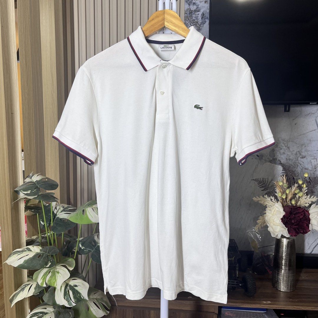 Lacoste Twin Tip Poloshirt (Category: Tshirts & Polo Shirts ) located in Bacolod City. Submitted by rndm.wears (Listing ID 1464502419, Image 1). Description: Lacoste Twin Tipped Poloshirt Size 5 / 27.5L 21W No issues.