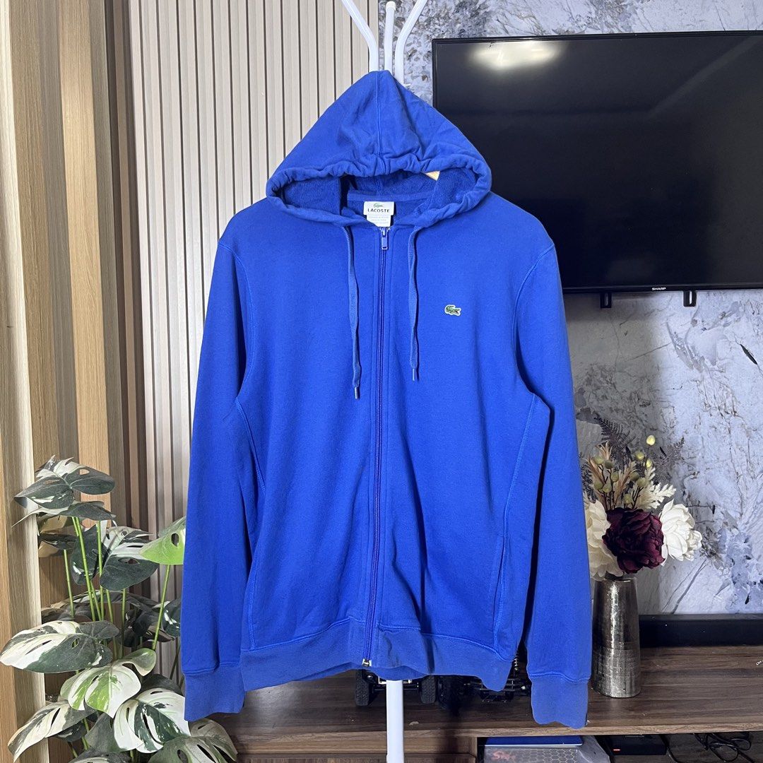 Lacoste Zip Up Hoodie Jacket (Category: Coats, Jackets and Outerwear) located in Bacolod City. Submitted by rndm.wears (Listing ID 1464501638, Image 1). Description: Lacoste Zip Up Hoodie Jacket Size 4 / 27L 22W Like new No issues.