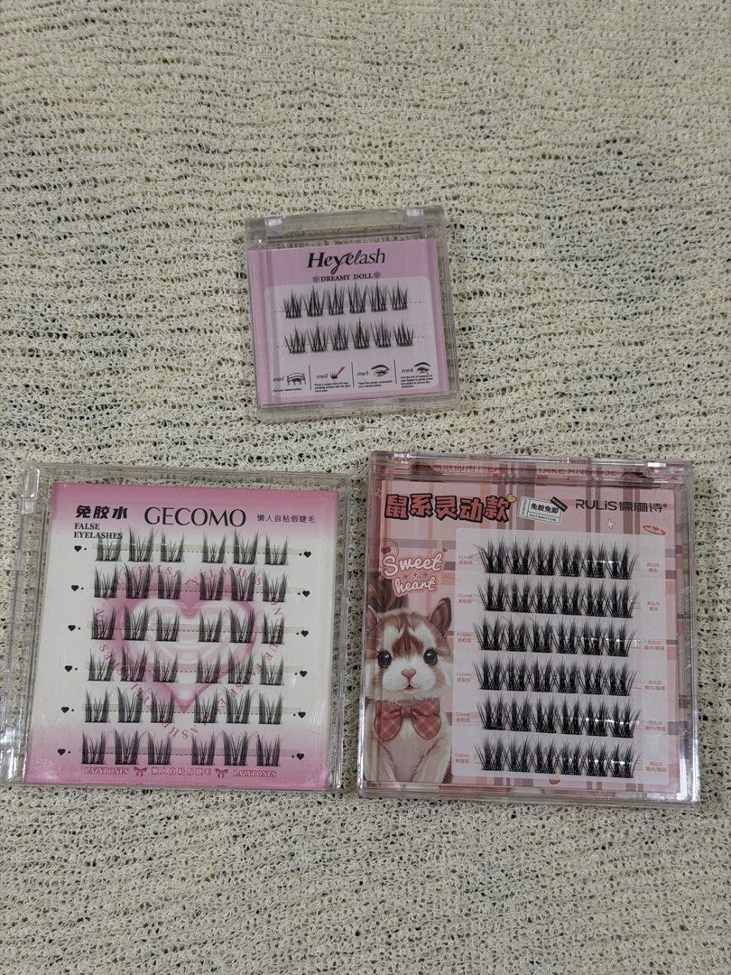 Lash Bundle 2 (Category: Makeup) located in Subang Jaya. Submitted by whencatsfly (Listing ID 1464506231, Image 1). Description: - Bundle of 3 self-adhesive false eyelashes - Includes Heyelash 'Dreamy Doll' - Includes GECOMO 'Lazybones' individual lashes - Includes RULIS 'Sweet Heart' lashes - Easy to apply for a quick lash upgrade - Perfect for everyday wear or special occasions.
