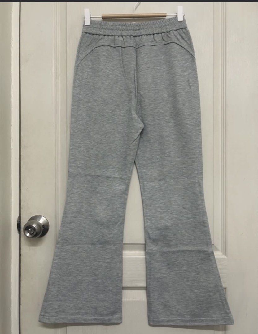 LE XI COSTUME Grey Flared Sweatpants Size L (Category: Activewear) located in Quezon City. Submitted by thingsdeclutter (Listing ID 1464440474, Image 2). Description: - Grey flared sweatpants from LE XI COSTUME - Elastic waistband with drawstring - Two side pockets - Comfortable and casual - Ideal for lounging or running errands - Size: L.