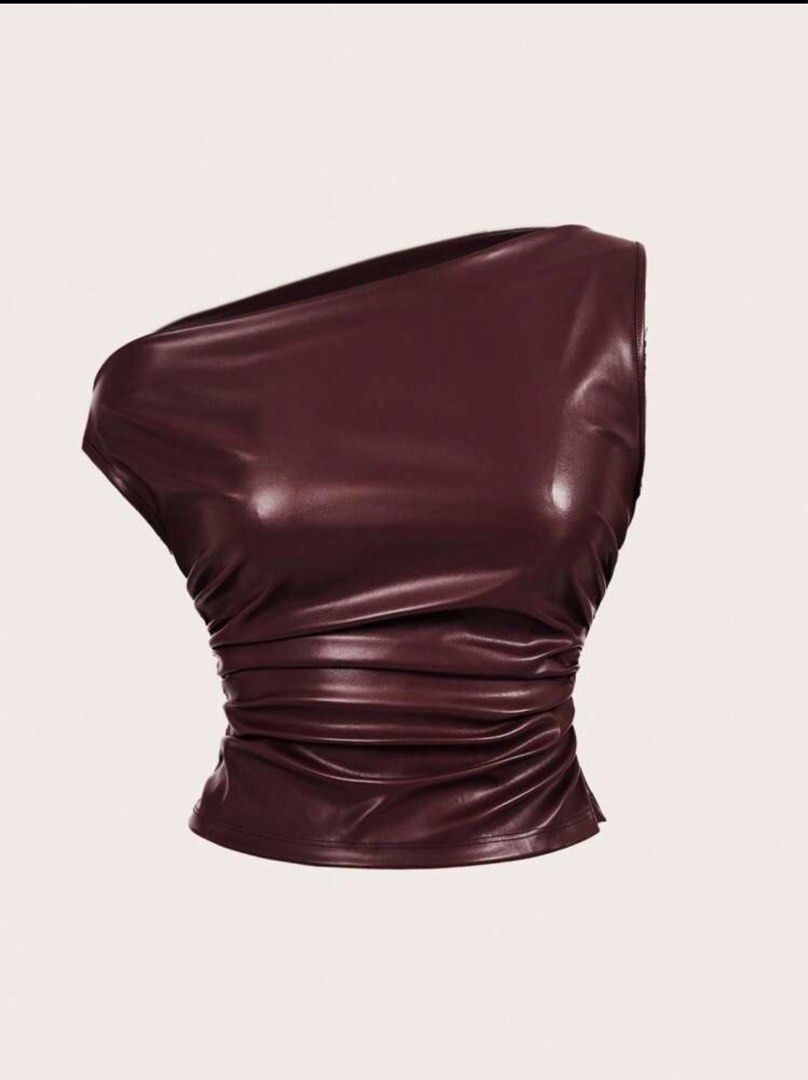 Leather Top (Category: Sleeveless) located in Pasig City. Submitted by dairob1203 (Listing ID 1464443712, Image 1). Description: Used once. Fit for 38-40 bust size | 30-33 waist line Good condition.